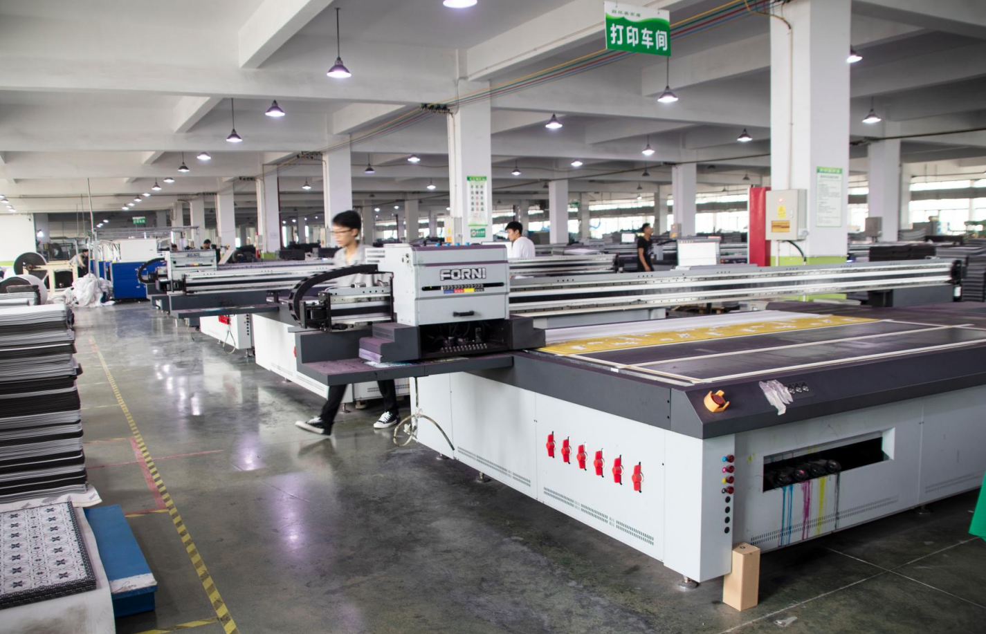 An advanced Wellfitsource manufacturing facility with cutting-edge machinery, dedicated to eco-friendly yoga mat production.