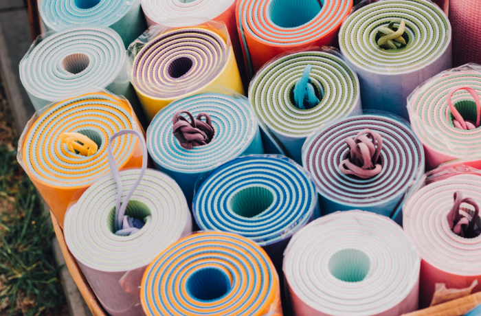 Colorful collection of yoga mats ready for use