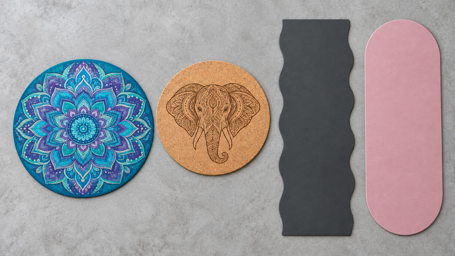 Round printed, round engraved cork and oval yoga mats laid flat beside a steel cutting die