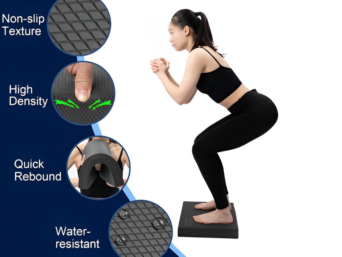 Woman doing squat on black foam pad with texture details and features shown.
