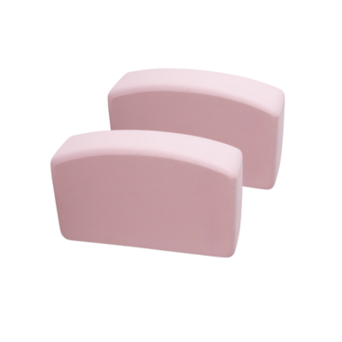 Pair of curved-edge pink EVA foam yoga blocks for wrist and knee support