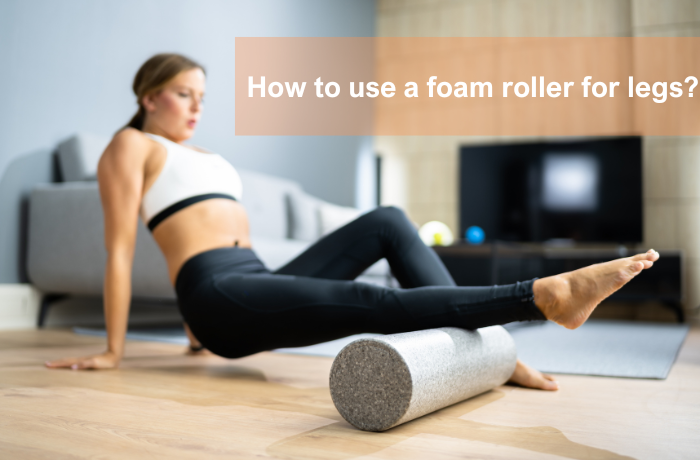 oman using a foam roller on her legs at home on a wooden floor