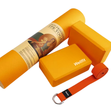Complete yoga kit with orange mat, matching cork block, foam block, and orange D-ring strap