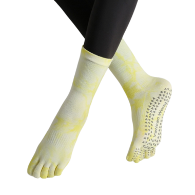Yellow five-toe grip yoga socks with subtle tie-dye pattern