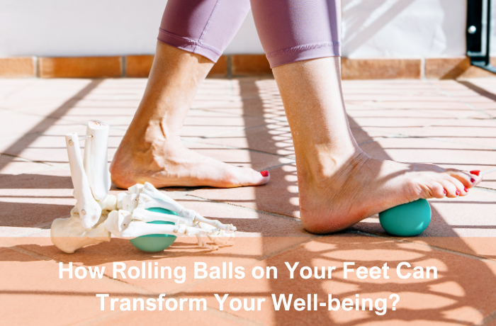 Foot rolling on massage ball next to a foot skeleton model for muscle relief