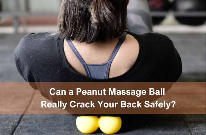 Athlete stretching back with peanut massage ball for spinal relief