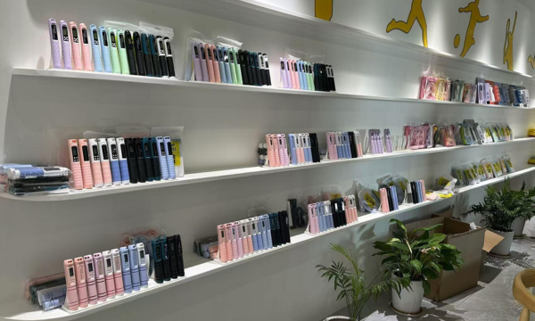 Display of various wholesale jump ropes in multiple colors at fitness product showroom.