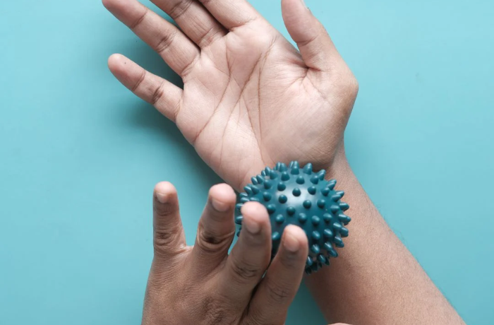 Spiky massage ball for hand and wrist relief therapy