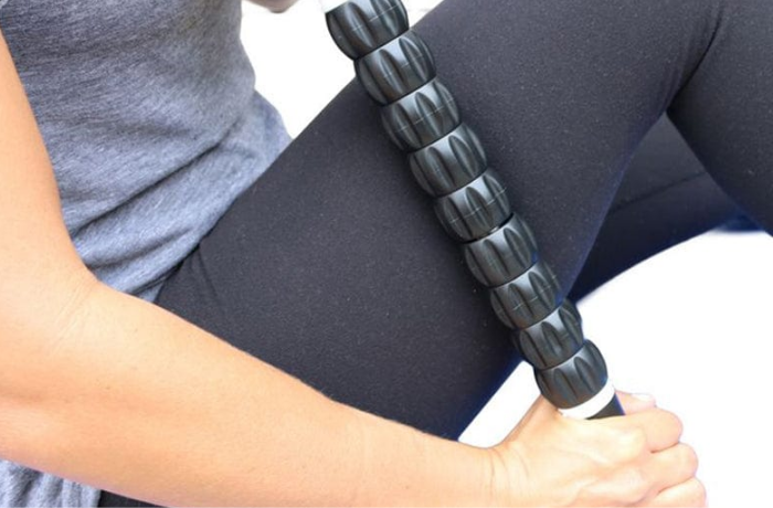 Using Massage Roller Stick on Legs
