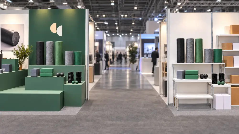 Two trade show booths displaying identical fitness products, illustrating OEM factory brand conflict