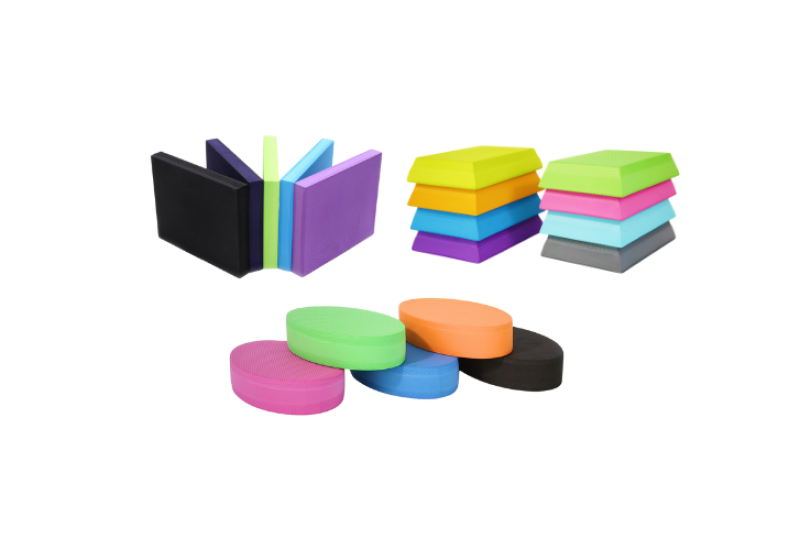 Bulk colored balance pads for fitness and yoga with a range of shapes.