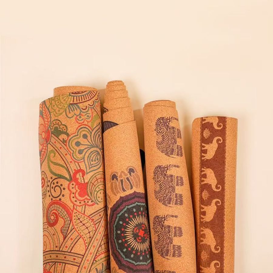 A collection of premium cork yoga mats featuring unique custom prints, offering sustainable, non-toxic, and durable performance for yoga practitioners.